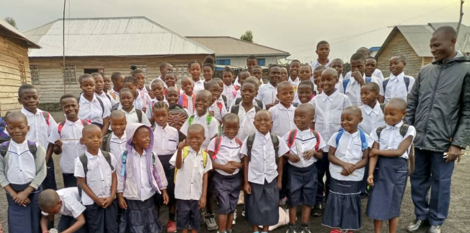 images of the students with one adult man